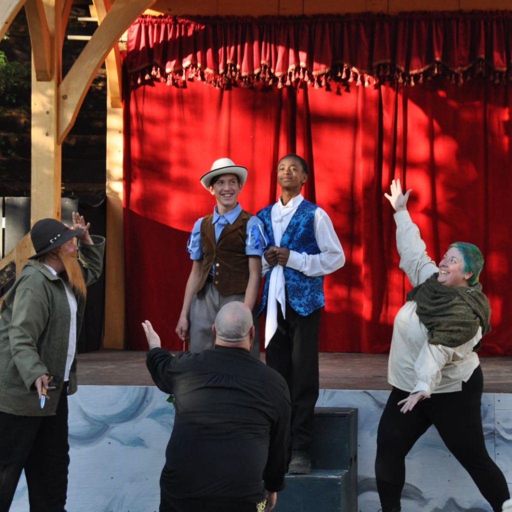 Archive photo of a Round Back performance. Ensemble performers from The Two Gentlemen of Verona.