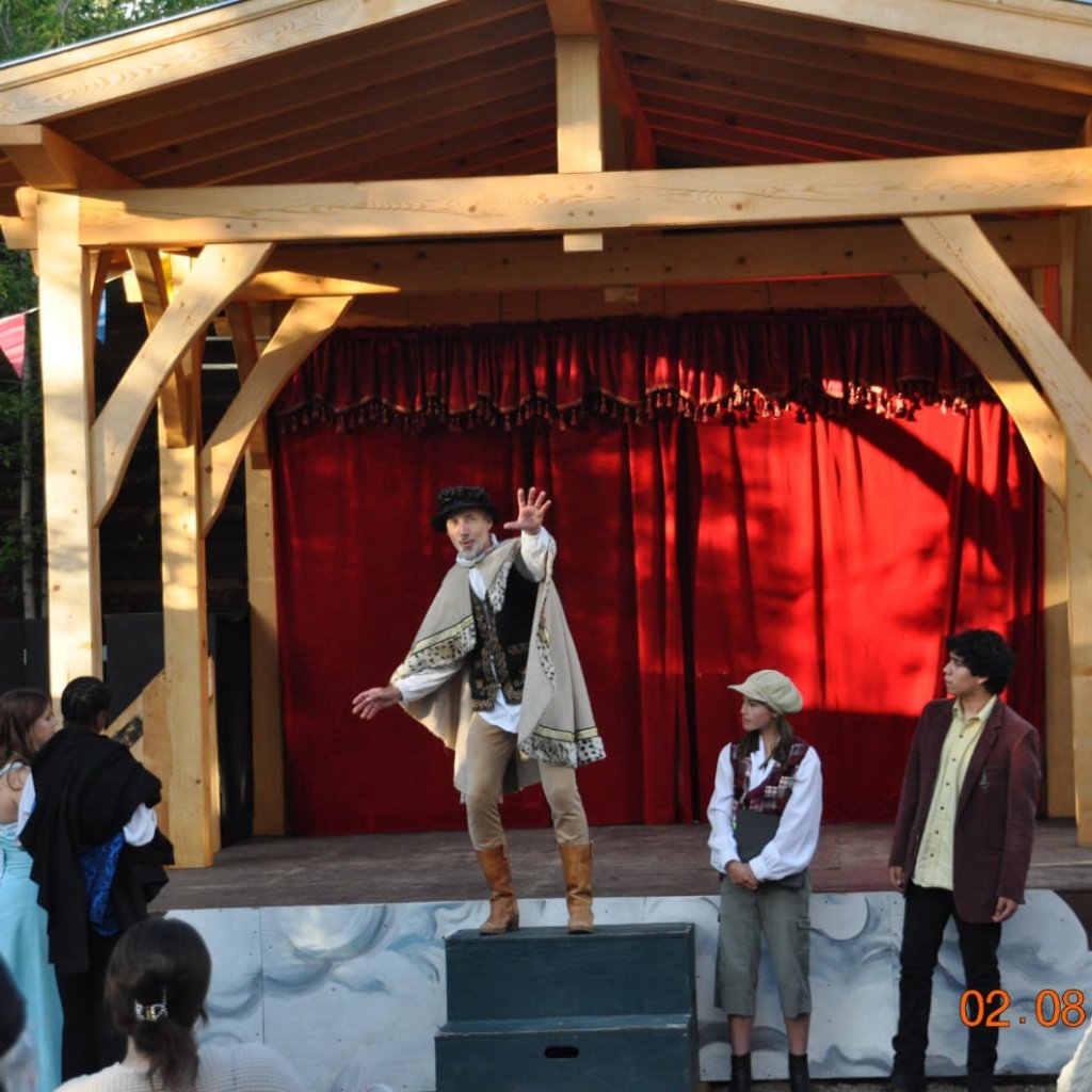 Archive photo of a Round Back performance. Ensemble performers in The Two Gentlemen of Verona.