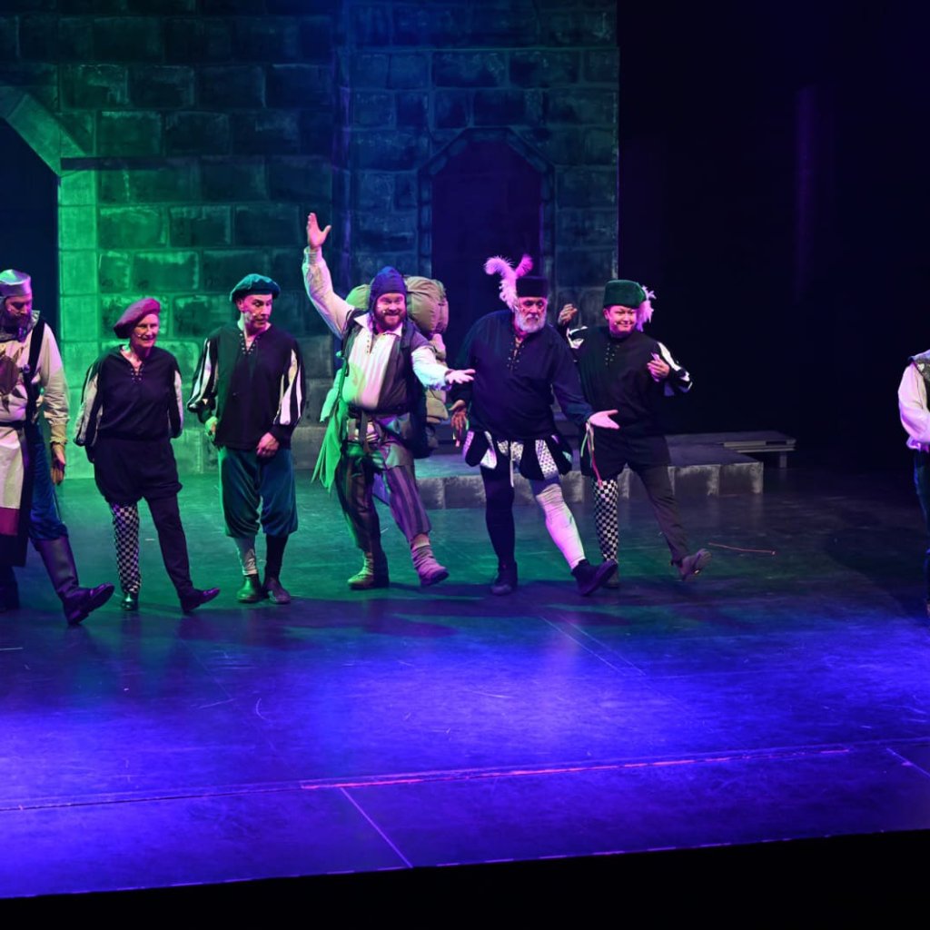 Spamalot archive photo. King Arthur and the Black Knight engage in a sword fight.